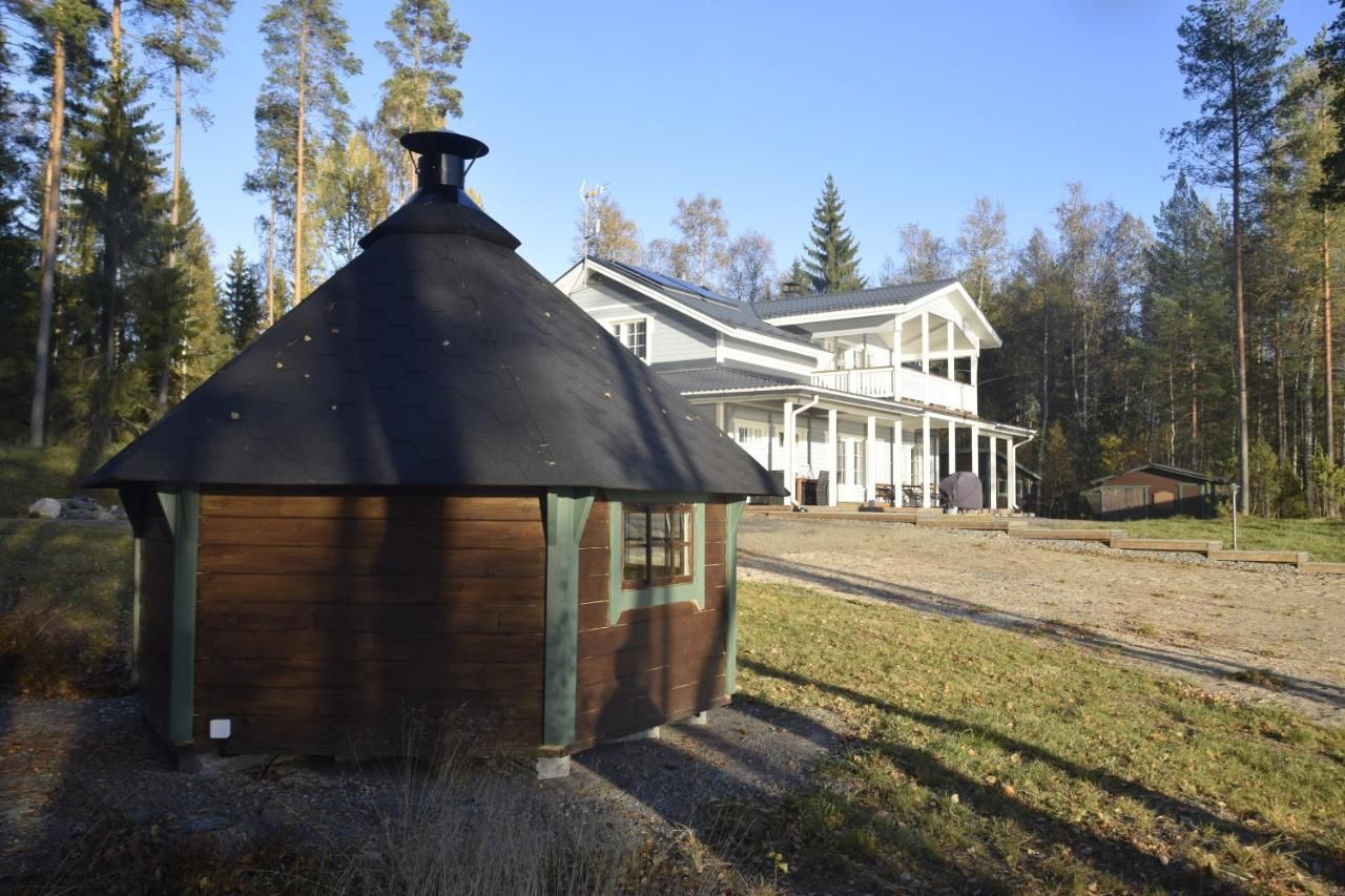 Виллы Lomapesä Cottages Пертунмаа
